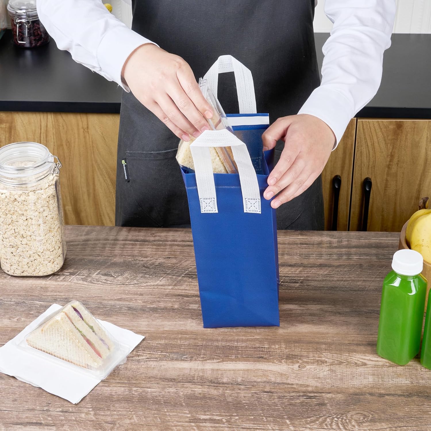 Restaurantware Insulated Delivery Bags 25 Count 4.72 x 3.94 x 11.02 Inches Nonwoven Take Out Bags For Food With Sturdy Handles, Blue Insulated Grocery Bags Tamper-Evident Foldable