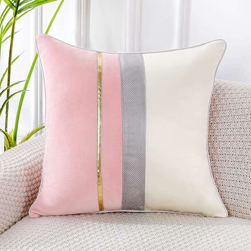 grey and pink pillows