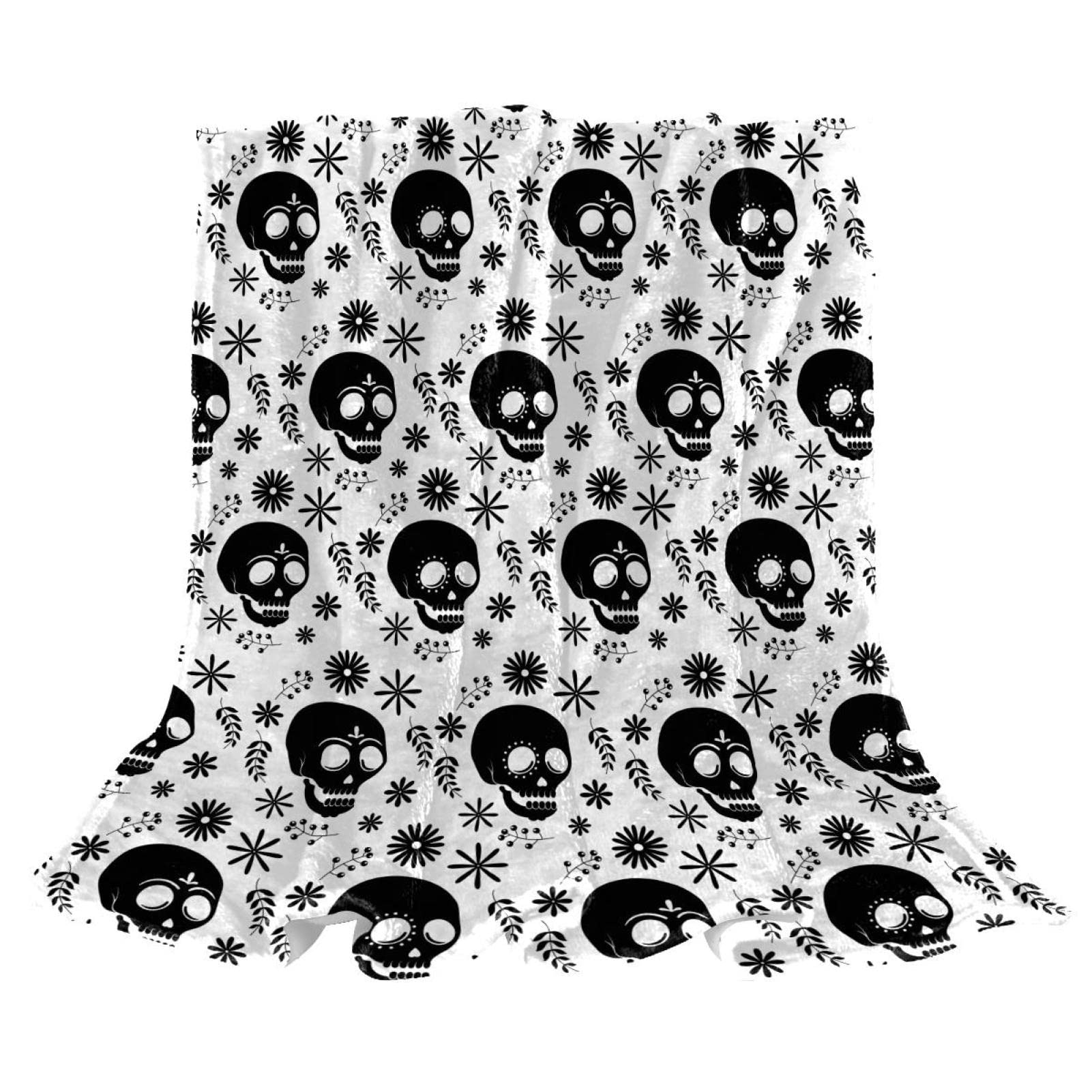 Couverture polaire légère motif tête de mort plaid noir lit