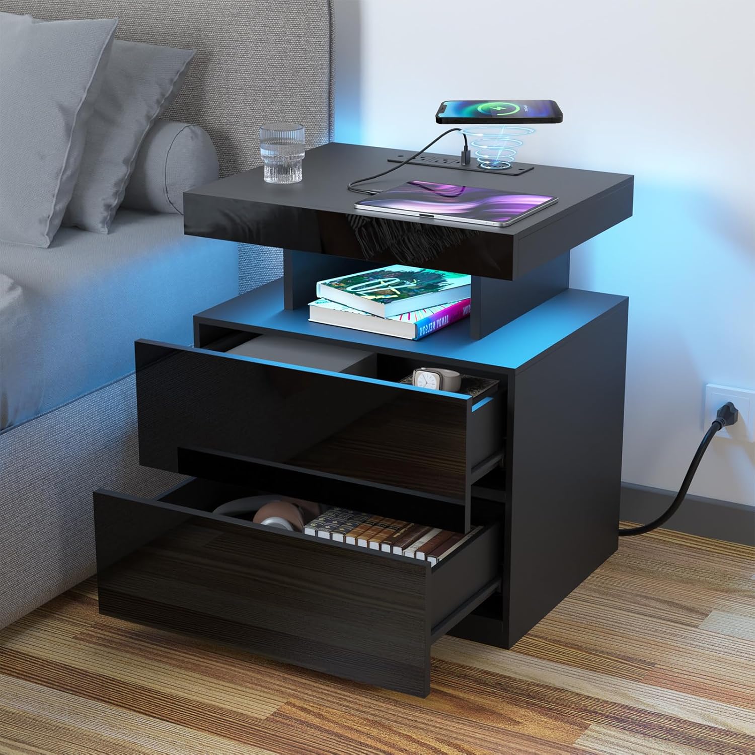 HOMMPA LED Nightstand with phone charging wirelessly, books, and headphones, illuminated by blue LED light.