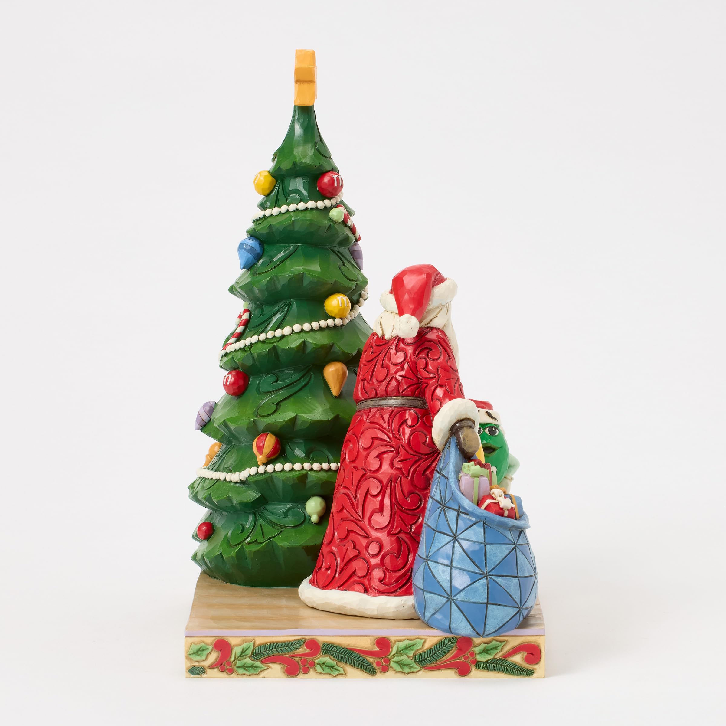 Enesco M&M's by Jim Shore Figurine de Père Noël avec Personnages Verts et Jaunes de Sapin de Noël, 21 cm, Multicolore