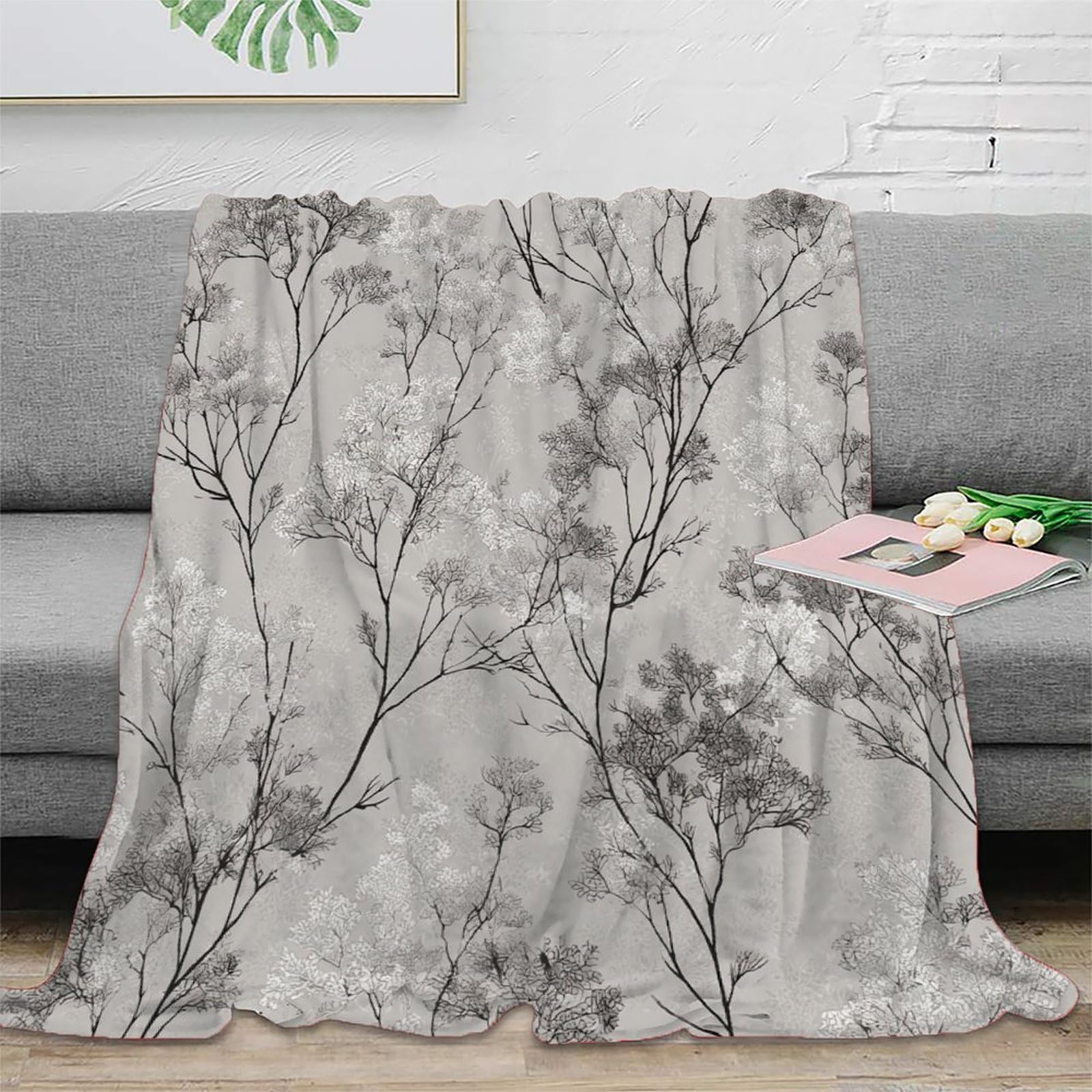 Couverture plaid hivers et nuits fraîches à motif botanique pour chambre d'amis et couple