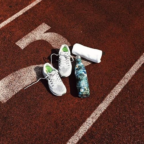 Miniatura 5 de S'well Los recipientes aislados al vacío de triple capa de acero inoxidable mantienen las bebidas frías durante 41 horas y calientes durante 18