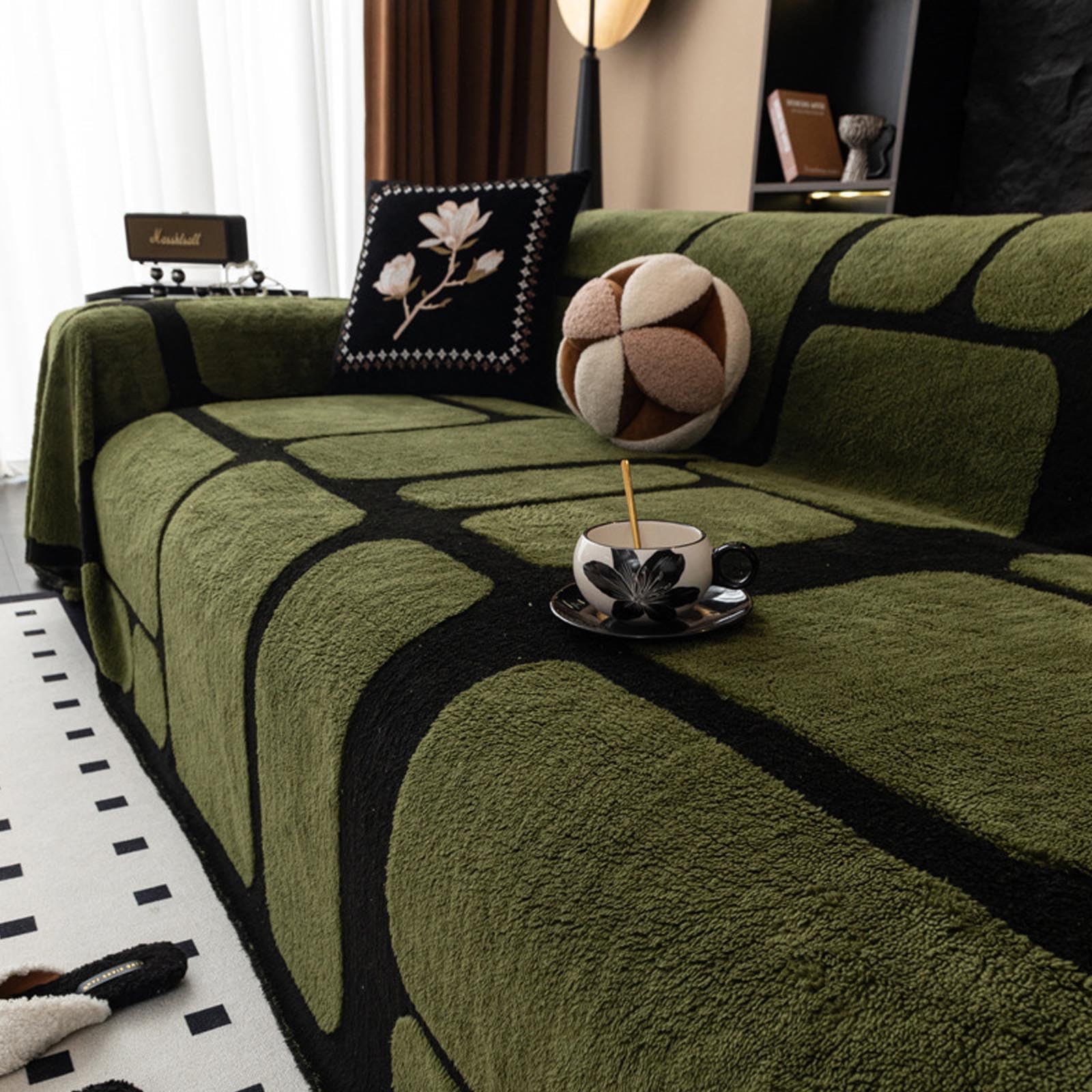 Housse de canapé lavable en machine verte pour un salon familial cosy