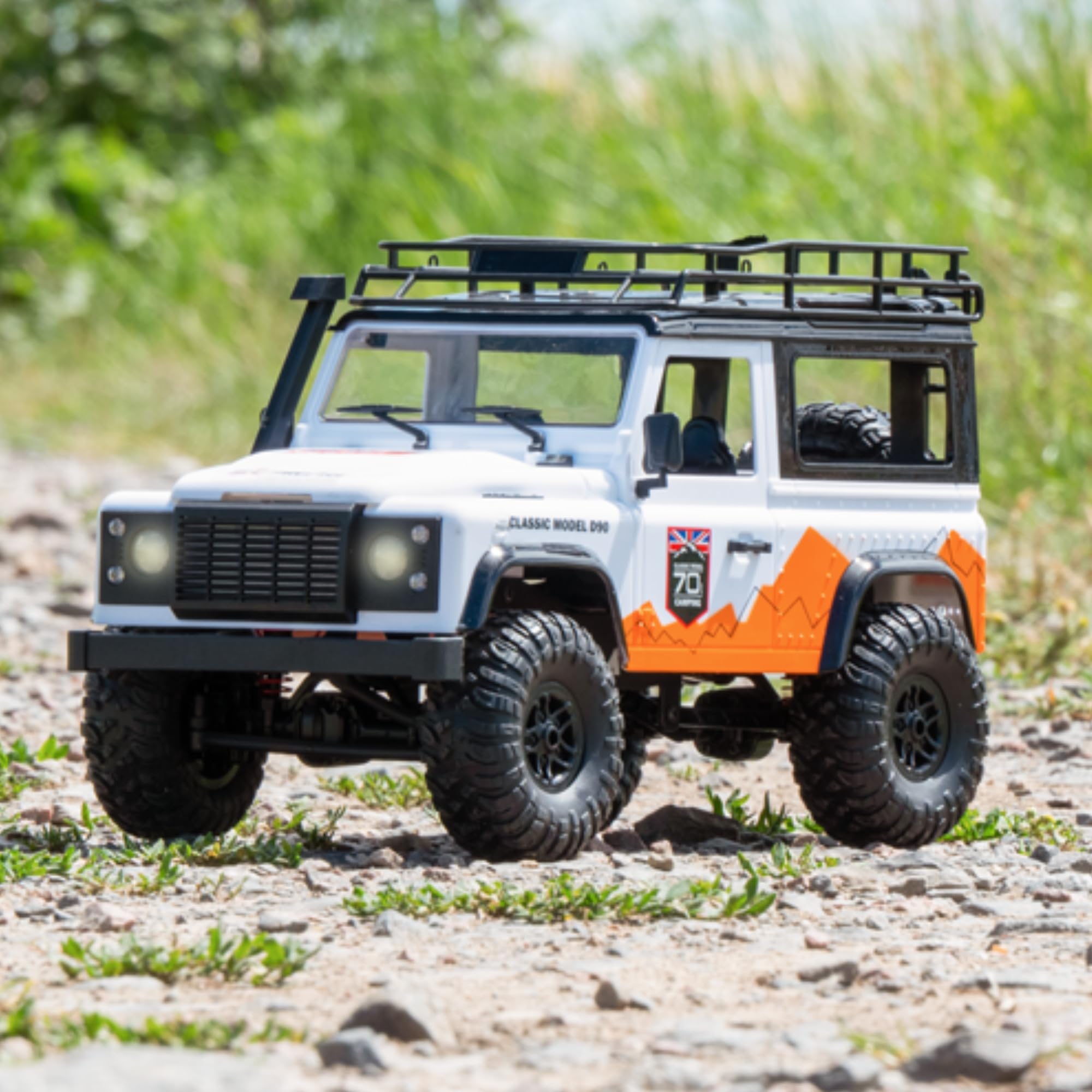 Coche teledirigido resistente 1:12 – Land Rover Trail V2 RC Coche 4WD para exteriores con luz LED, caja de engranajes metálicos, 60 minutos de tiempo de conducción, vehículo todoterreno