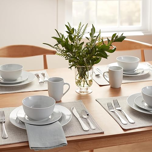 Miniatura 9 de Amazon Basics Juego de vajilla de porcelana de 16 piezas con platos, cuencos y tazas, servicio para 4 personas, color blanco