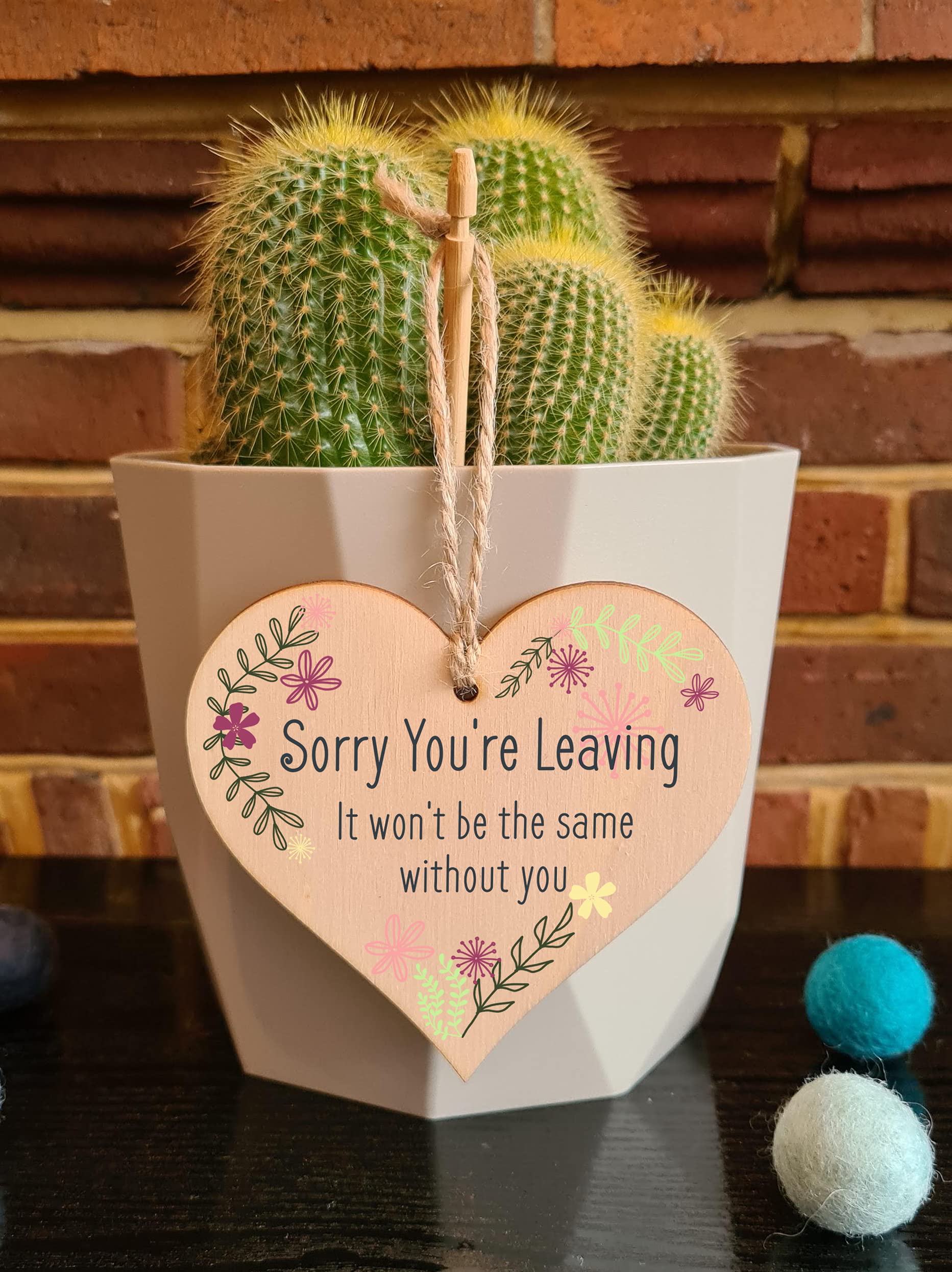 Targa in legno a forma di cuore con scritta Sorry You're Leaving Hanging Heart, da