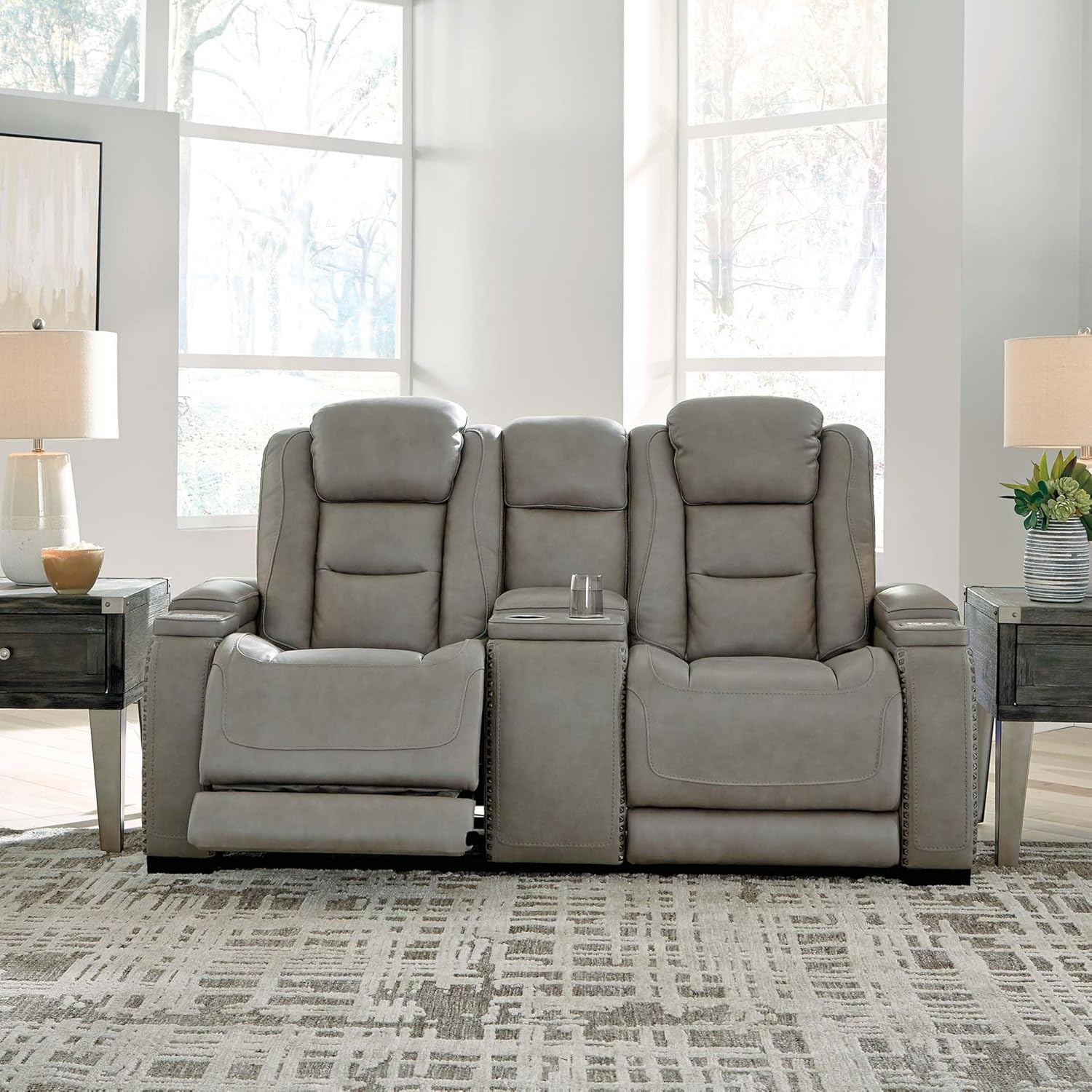 Signature Design by Ashley The Man-Den Leather Power Reclining Loveseat with Center Console, Adjustable Headrest & Wireless Charging, Gray
