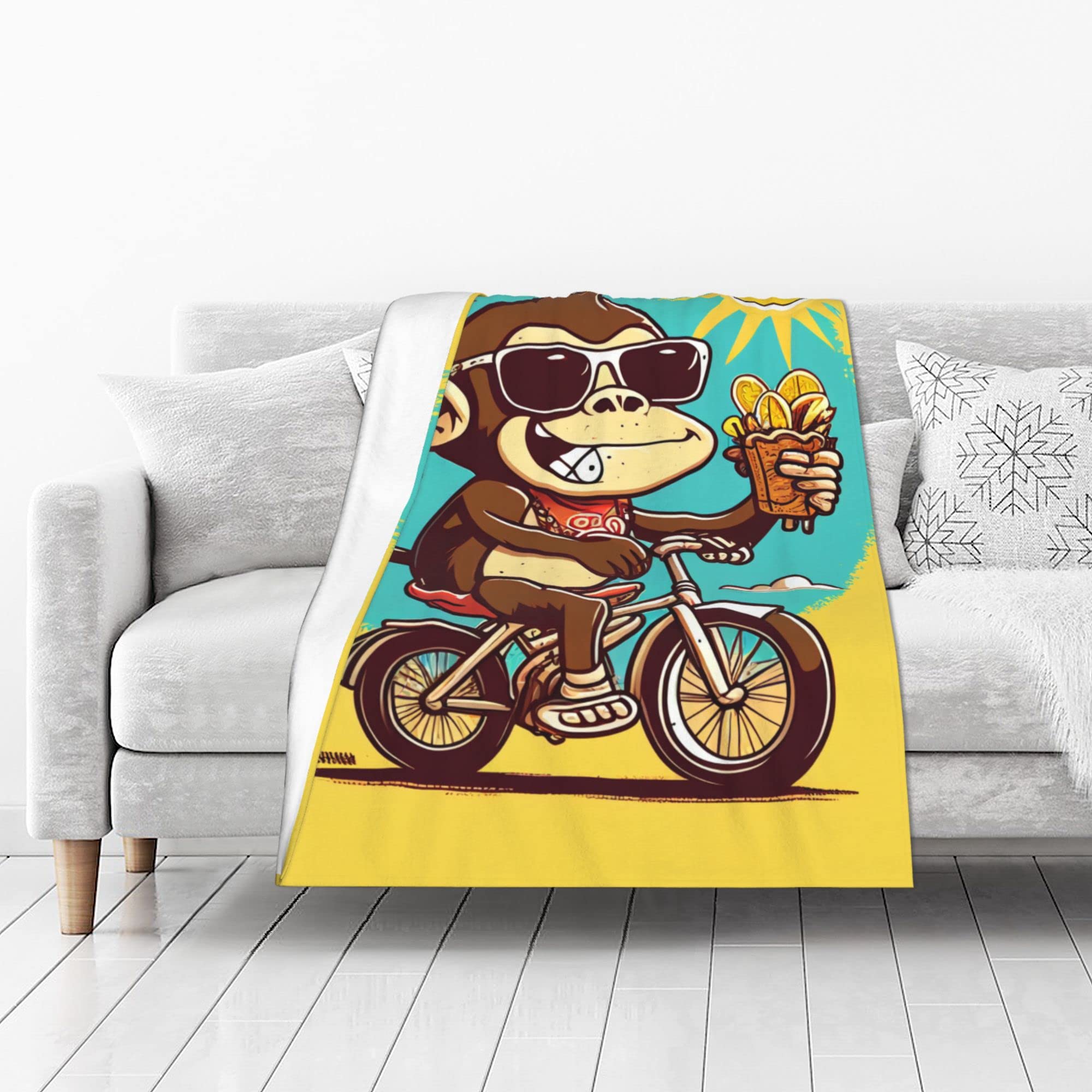 NEI-WAIMonkey Biking Happy Snacker Flannel Blanket - Comfortable, Warm, and Skin-friendly, Whimsical Monkey Pattern, Ideal for Sofa, Bedroom, Travel, Symbolizing Energetic Lifestyle, 76x100CM