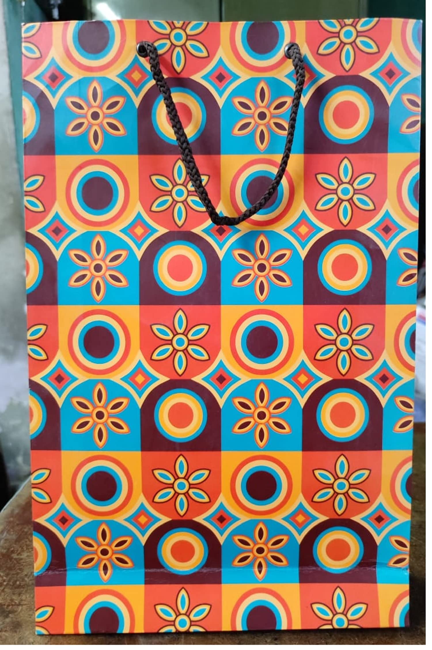 Peeplvalue Pack of 10 Medium Size designer Gift Paper bags with traditional prints and Colors for gifting in wedding baby shower anniversary and other occasions (Multi-Rangoli design) (B0BL1Q96Z5) Amazon Price History, Amazon Price Tracker