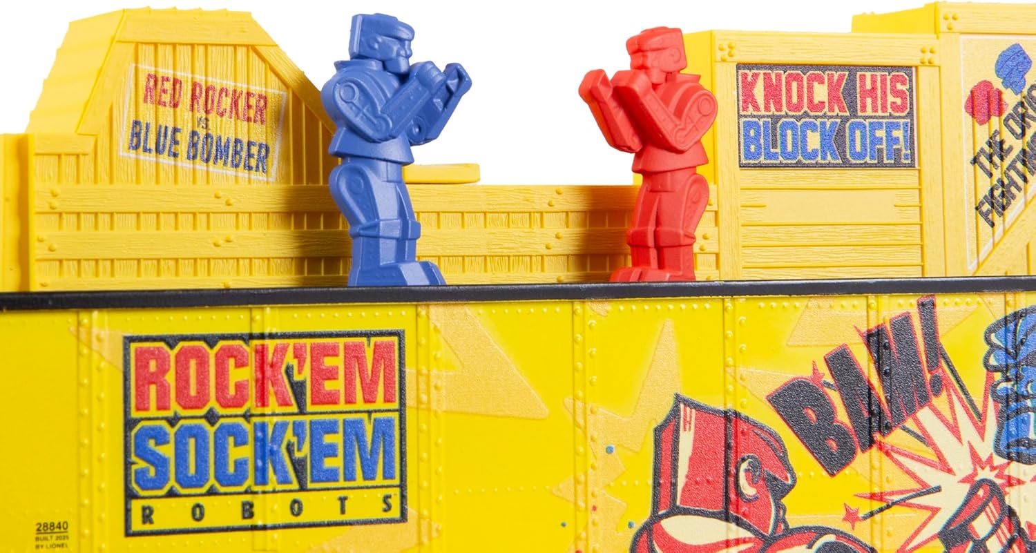 Another close-up of Rock Em Sock Em Robots on gondola car