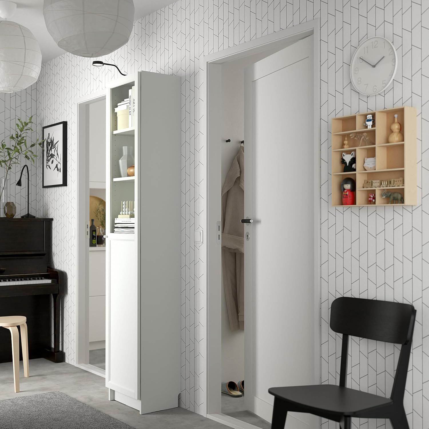 Interior view of the IKEA Billy/OXBERG bookshelf showing adjustable shelves and hinges