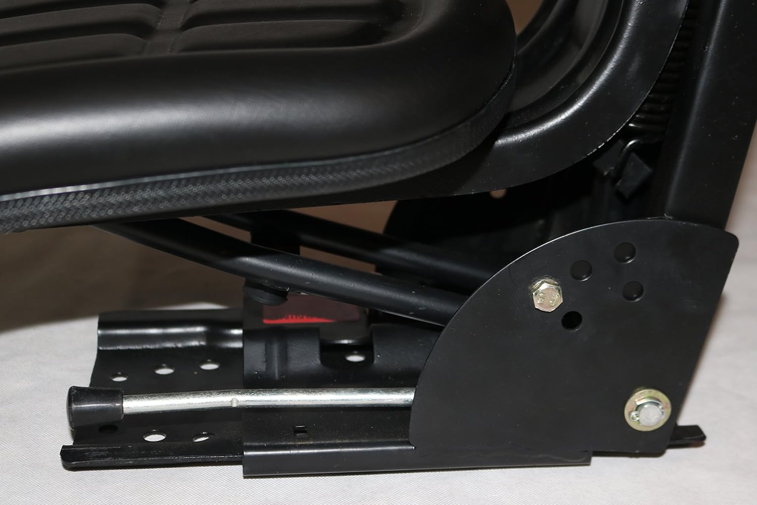 TRAC SEATS BRAND BLACK WAFFLE STYLE UNIVERSAL TRACTOR SUSPENSION SEAT WITH TILT FITS FORD/NEW HOLLAND 600, 601, 640, 800, 801, 860. (SAME DAY SHIPPING - Delivers in 1-4 Business days)