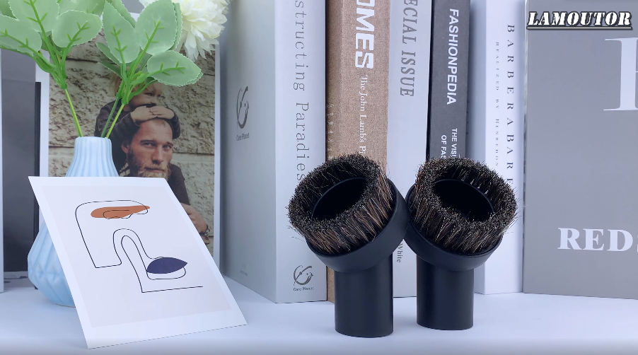 Round dusting brush being measured with calipers to show its diameter.