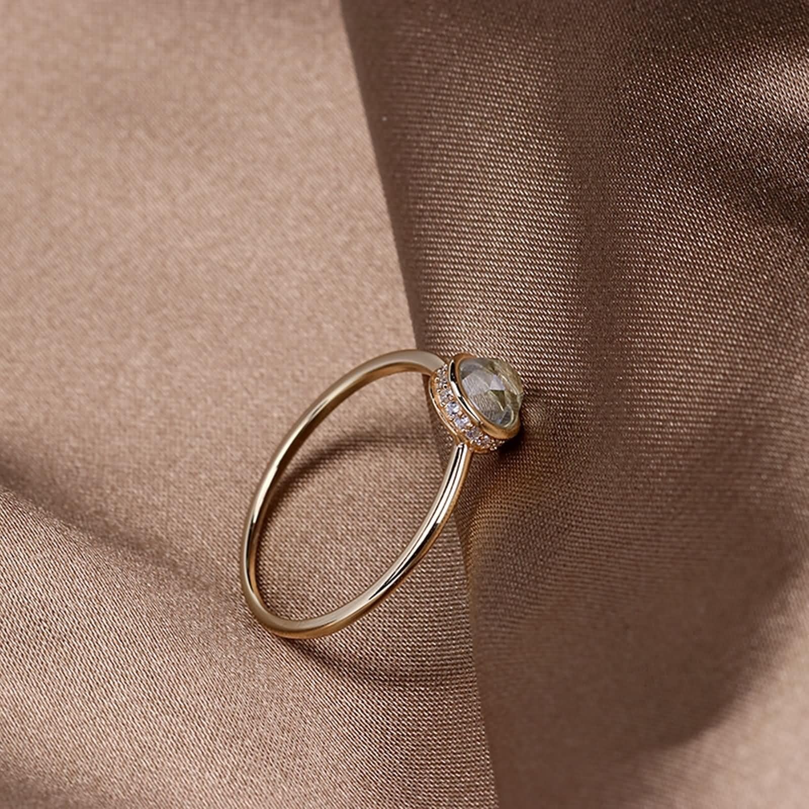 Alianzas Au 375/585/750 oro con topacio azul claro, anillo de compromiso solitario