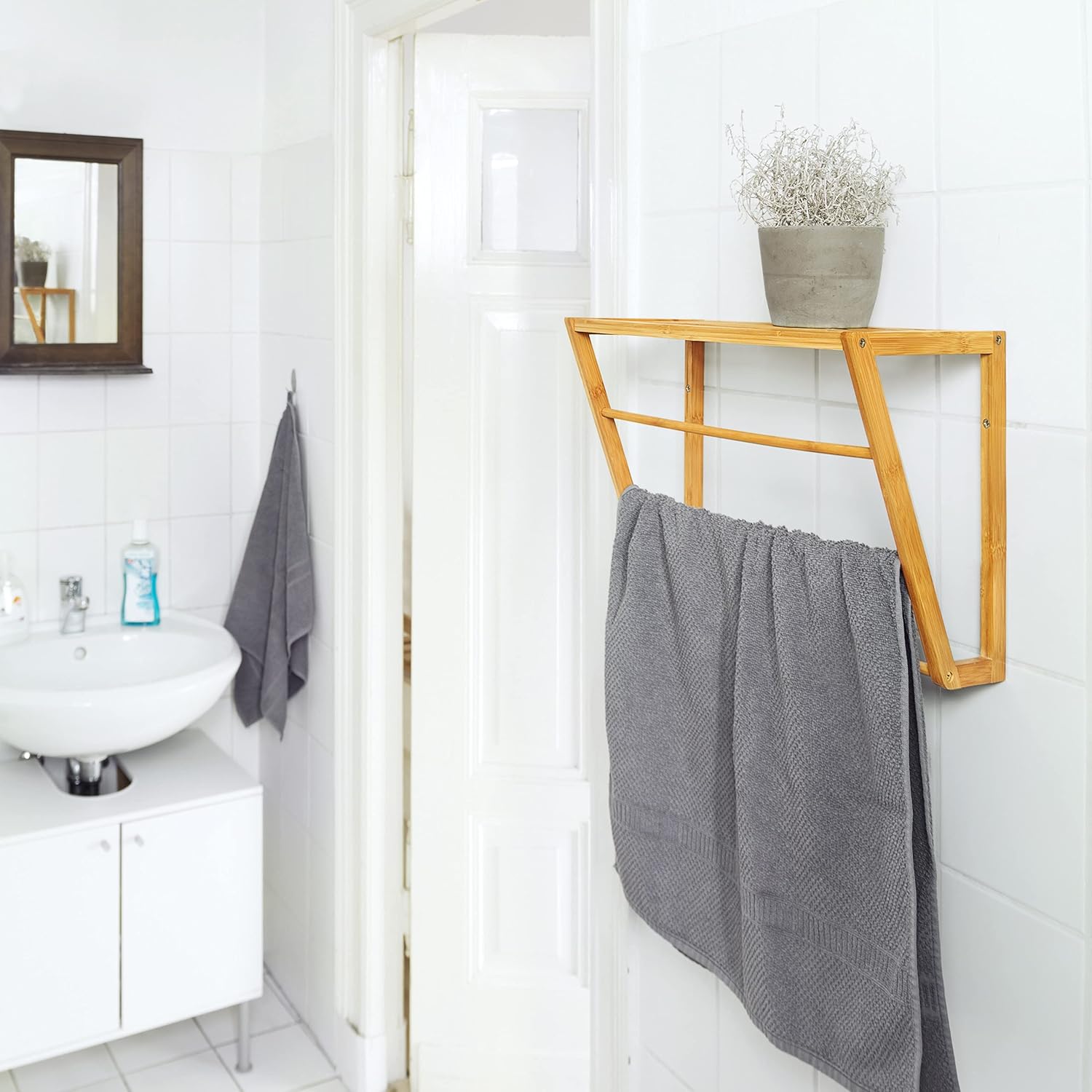 Relaxdays Bamboo Towel Holder installed in a bathroom