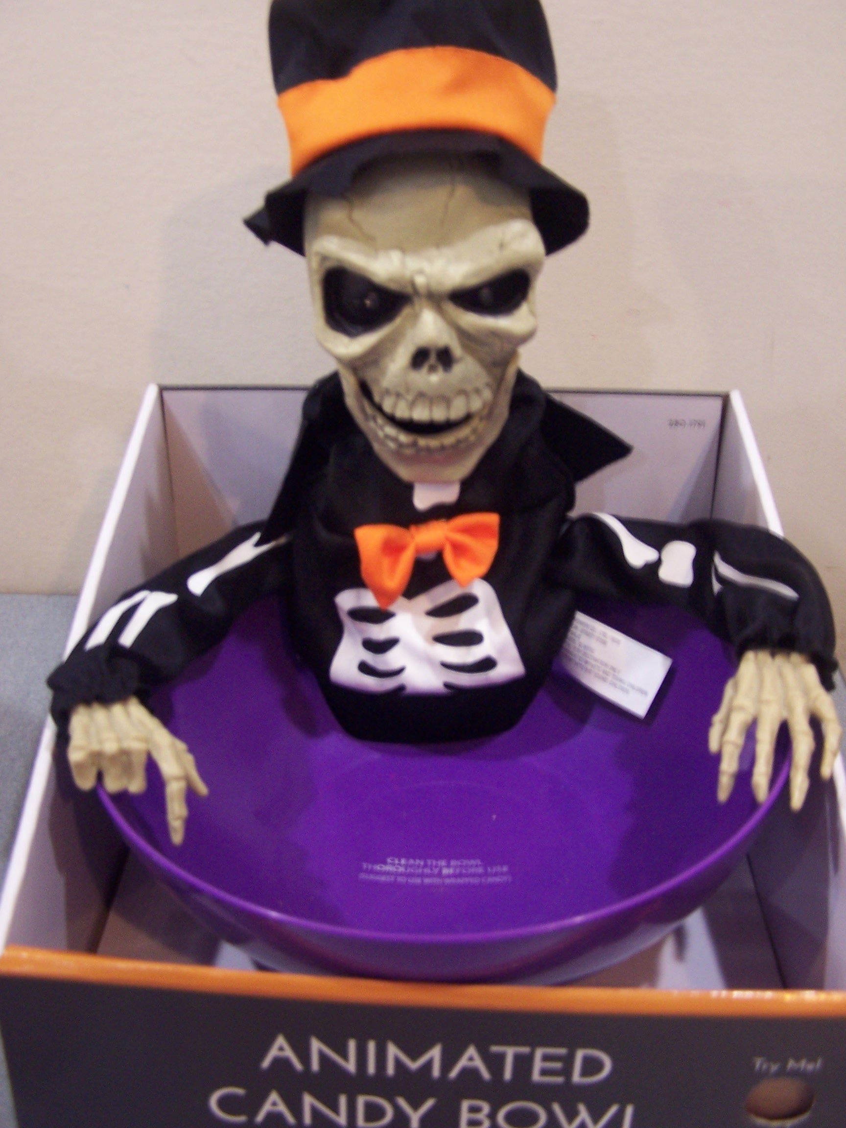 Animated Skeleton Candy Bowl - Batteries Included - Moves and Says 7 Different Sayings! - Bowl Color Vary Between Black or Orange