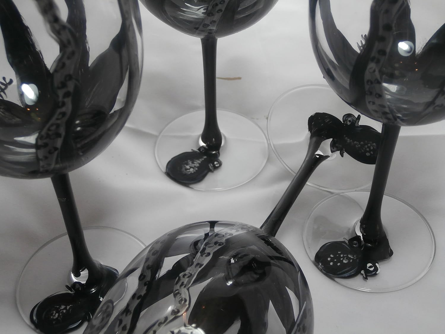 Hand painted black octopus goblets. Great set. usa. Set of 4 goblets..12 ounces each.