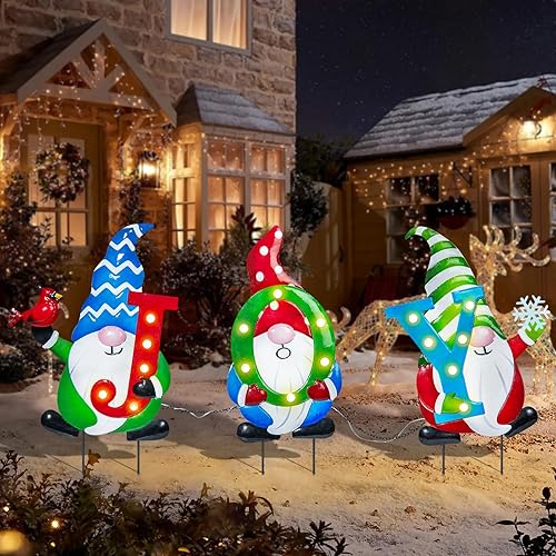 Afirst Decoraciones de Navidad para patio al aire libre  Estacas de Navidad para patio, gnomos que sostienen JOY Estacas de metal iluminadas para