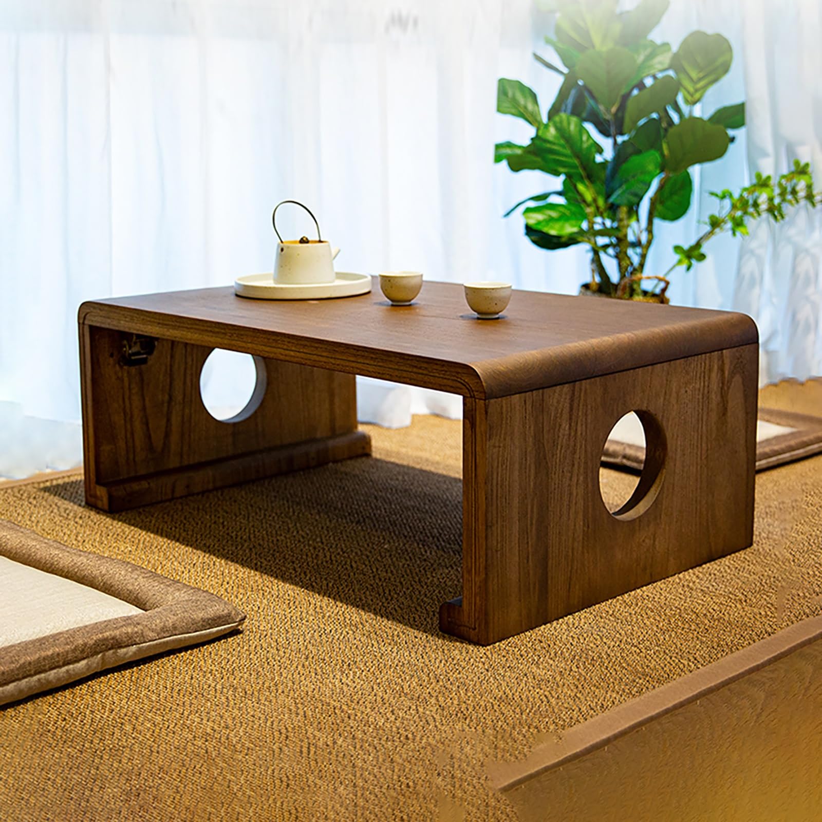 Table basse pliable en bois noble au design japonais et aux finitions épurées haut de gamme