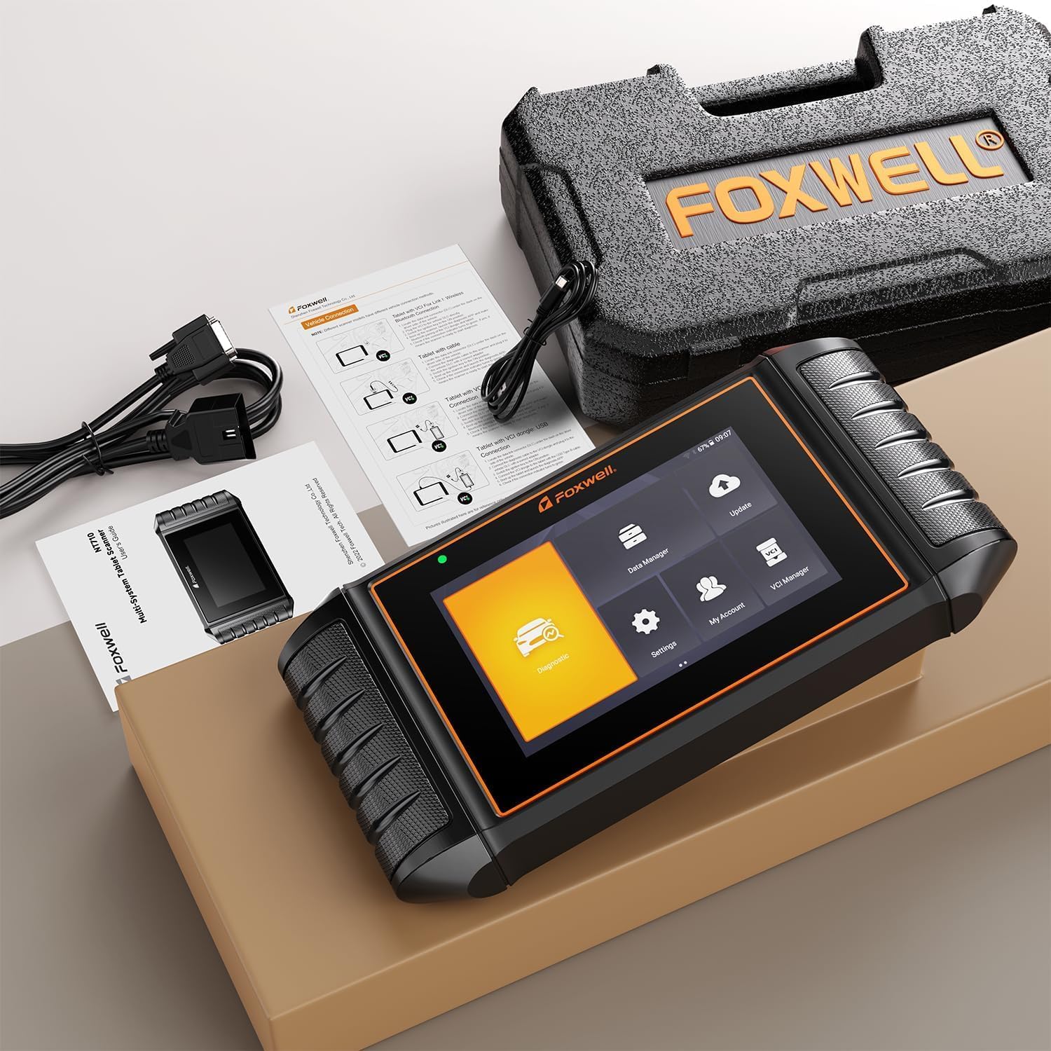 Contents of the FOXWELL NT710 package including the scanner, cables, and carrying case.