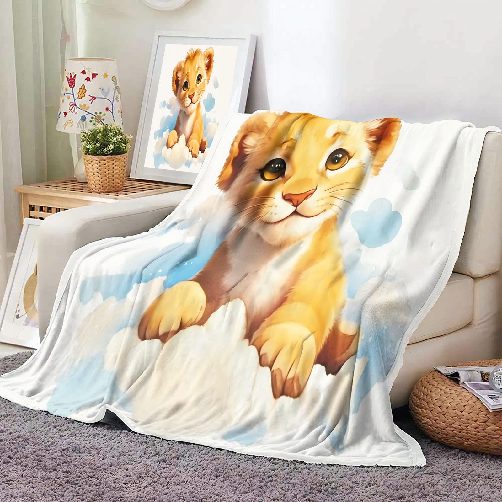 Couverture enfant nuages lion plaid polaire pour accompagner les soirées cinéma sur le canapé