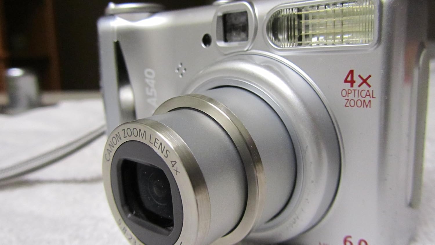 Front view of the Canon PowerShot A540 with lens extended for zoom