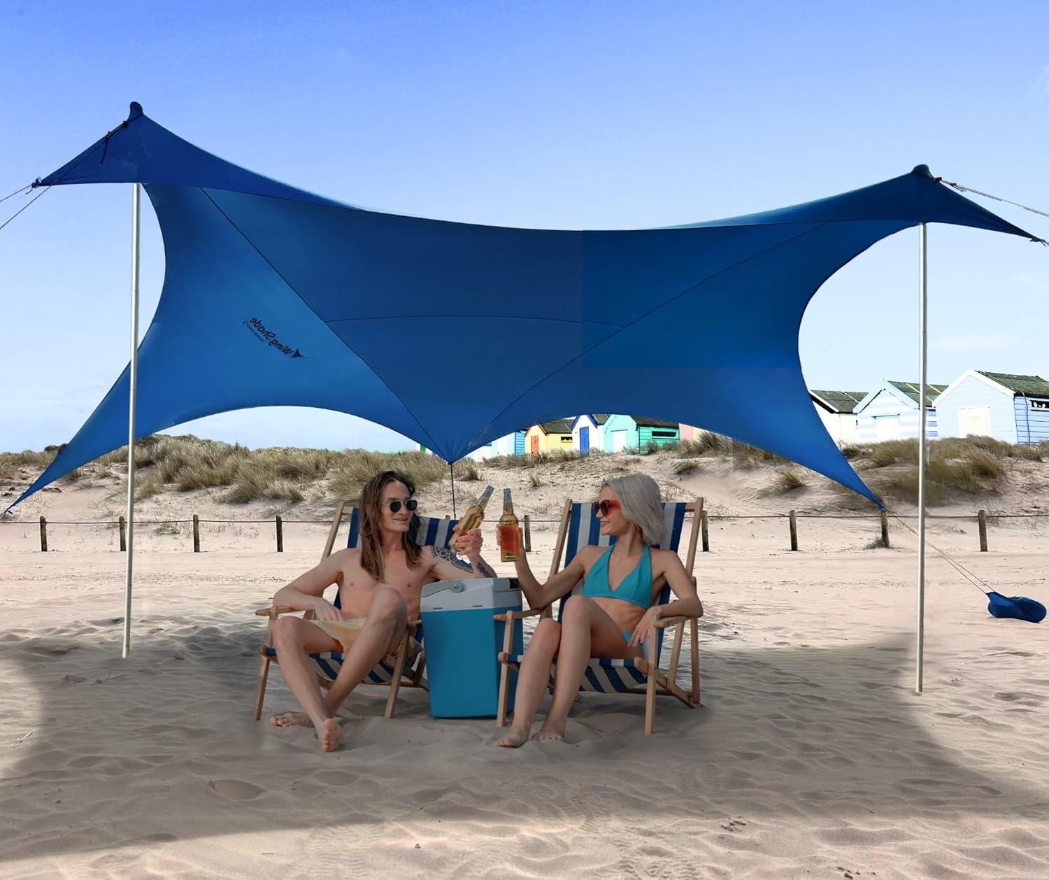 Wing Shade Beach Tent Sun Shelter Canopy UPF50+ Protection, 10x10 FT Shade, Pop Up Canopy - Easy Setup, 8 Sandbags, Carry Bag, Ground Pegs and Poles, Sand Shovel Camping, Fishing, Backyard or Picnics Light Blue