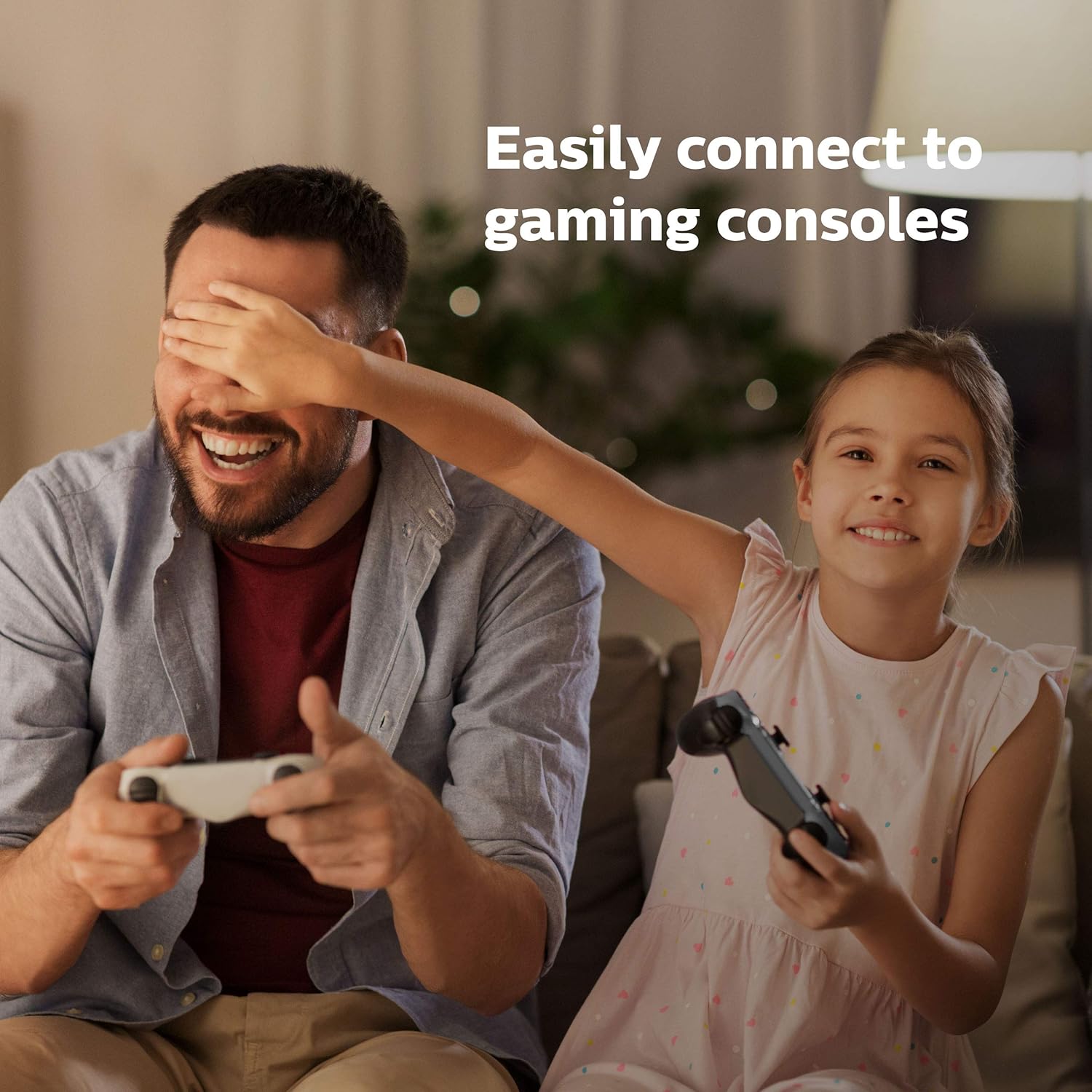 Philips NeoPix Easy+ Projector with remote control, highlighting built-in sound