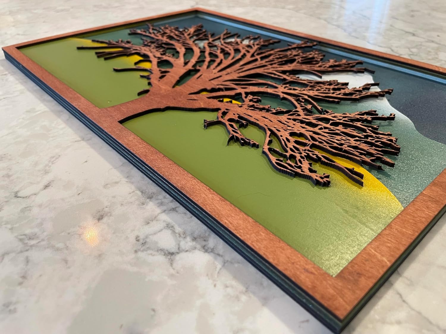 Ethereal Landscape: 16"x10" Multi-Layered Wood Wall Art - Wood-Stained Tree, Rolling Yellow Hills, Snowy Peaks, Blue Sky - Rustic Decor