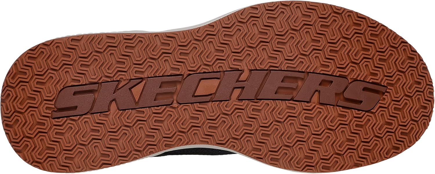 Skechers Men's Cyrus-Shaw shoe, sole view, showing the traction pattern and Skechers branding.