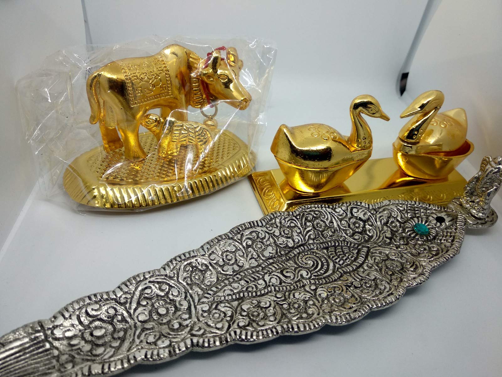 Beautiful Puja Ideal Roli Chawal Case, Agarbatti Holder Leaf, and Baby Cow for Decoration (Golden)