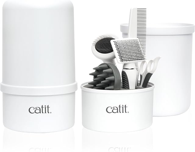 Catit Grooming Kit for Shorthaired Cats. Canister includes 5 tools; rubber palm brush, nylon slicker brush, metal slicker brush, fine comb and curved nail clippers