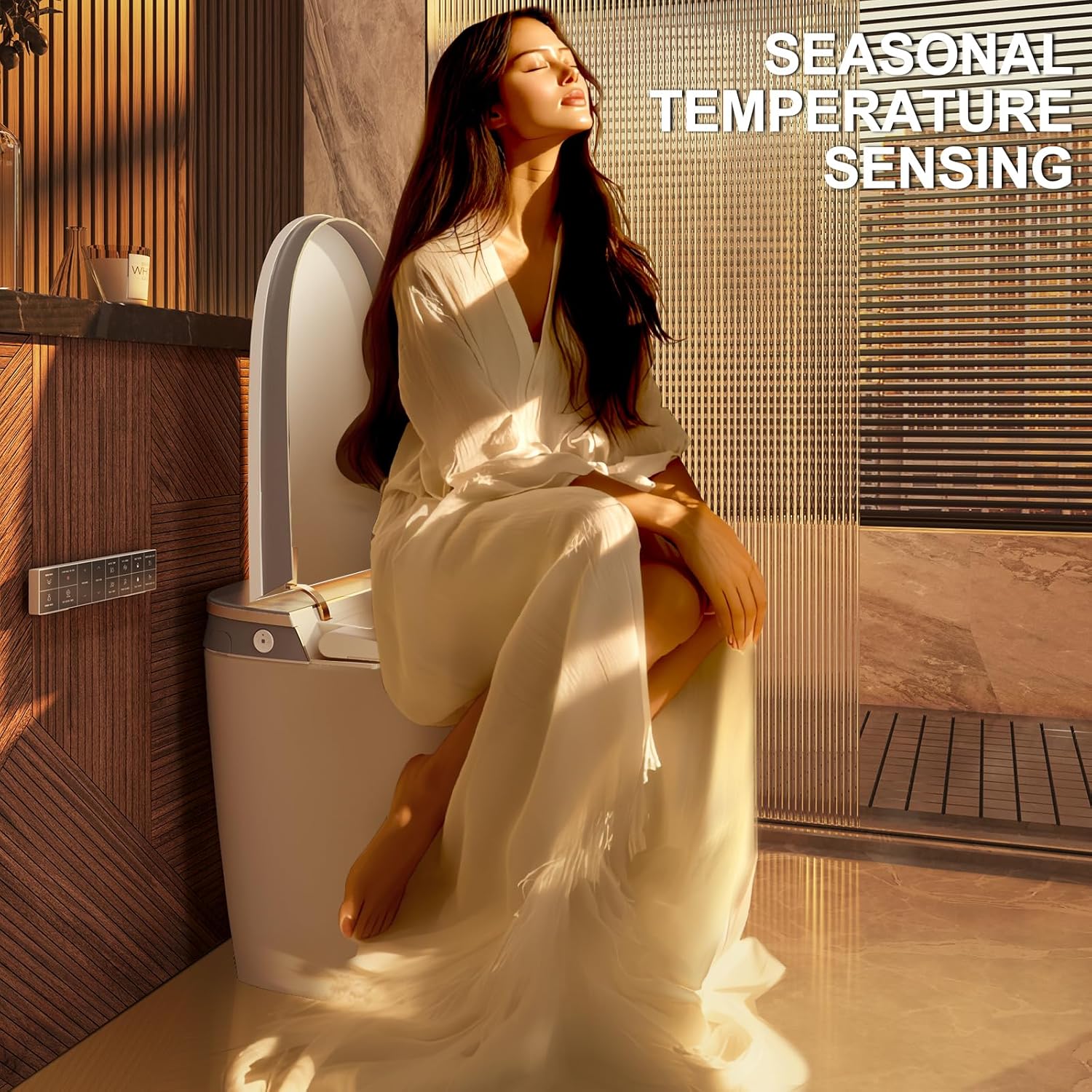 Person sitting comfortably on the smart toilet, illustrating the heated seat and seasonal temperature sensing feature