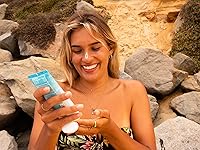 Vista 3 de Protector solar Surface Dry-Touch, seguro para arrecifes, sensación ultraligera y limpia, protección UVA/UVB de amplio espectro, libre de parabenos