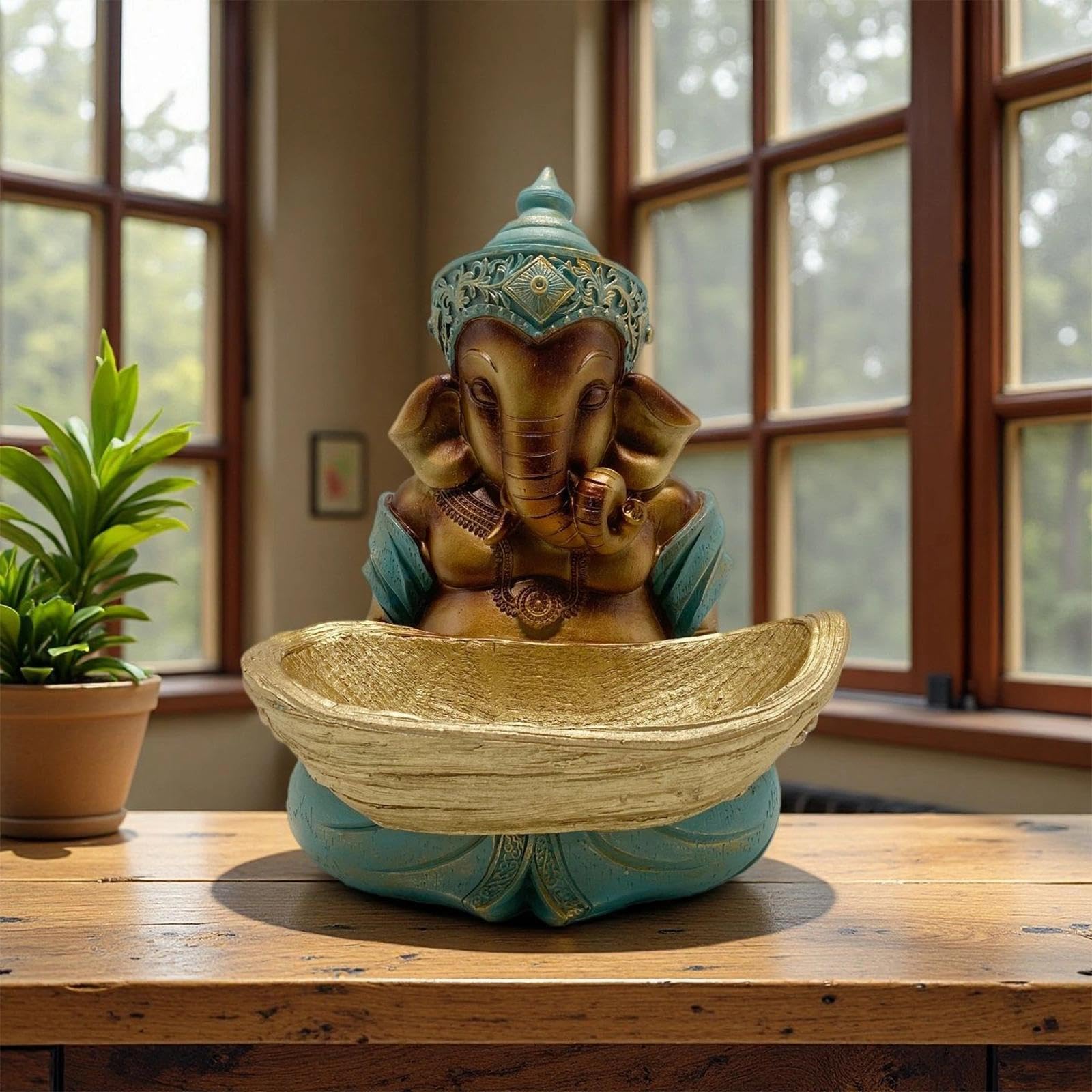 Figurka Ganesha z żywicy z świecznikiem, 32 cm, figurka religijna - ręcznie malowana indyjska dekoracja jako dekoracja stołu i medytacji, figurka boga słonia