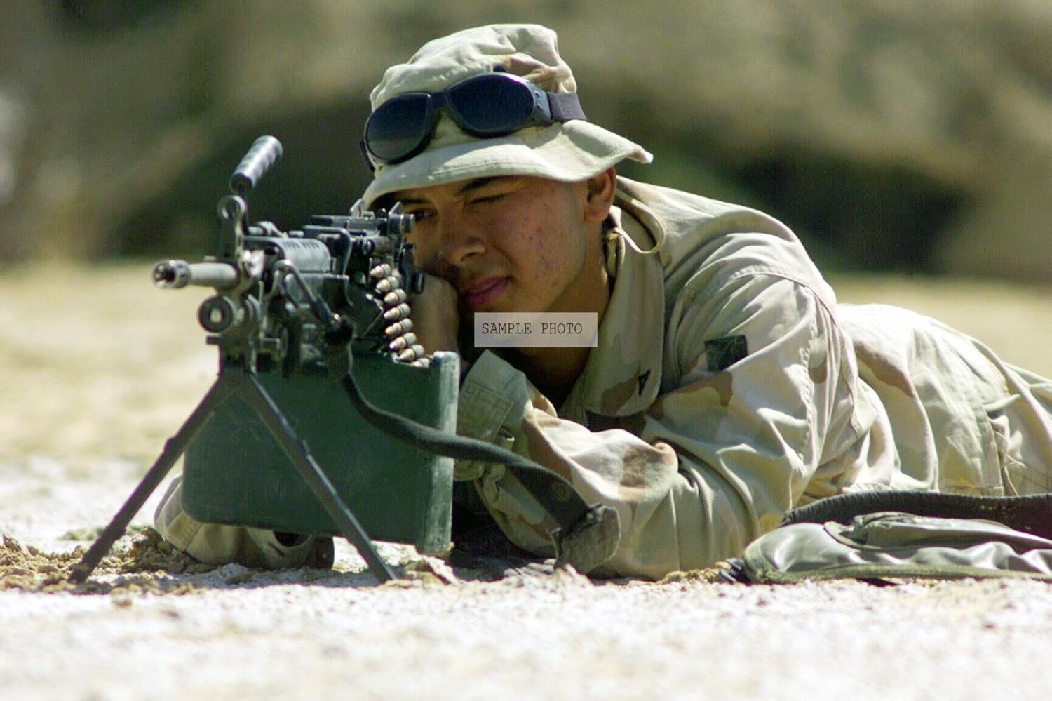 Photo Armed with an FNMI 5.56mm M249 Squad Automatic Weapon (SAW), Lance Corporal