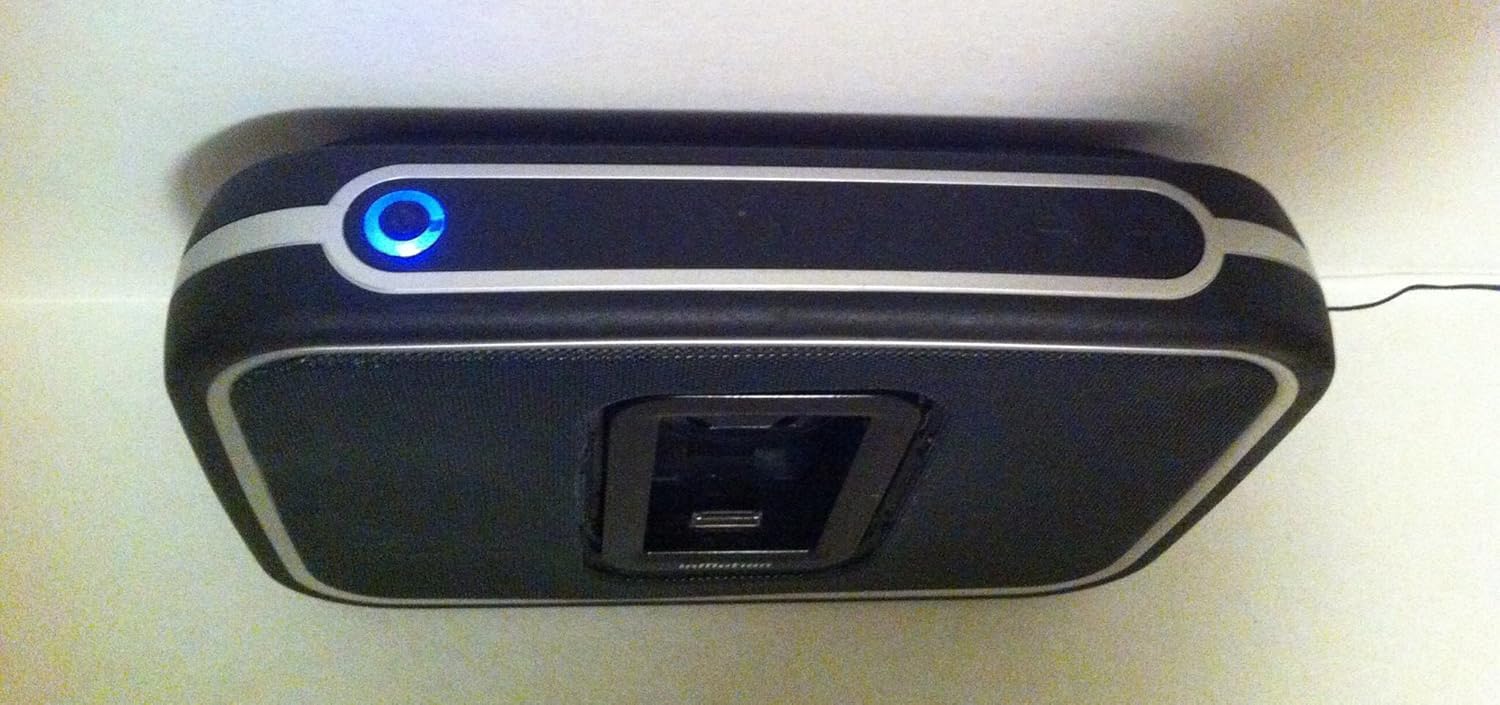 Top view of Altec Lansing iM9 speaker showing power button and volume controls