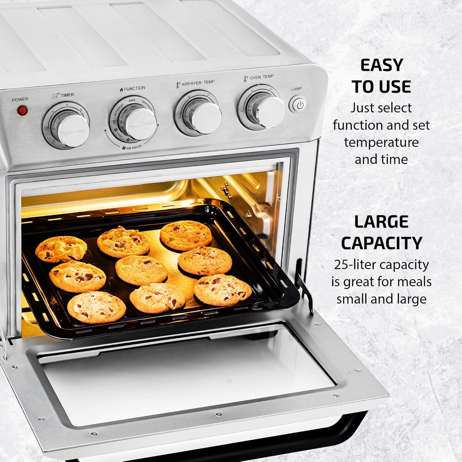 OVENTE Air Fryer Toaster Oven Combo with the door open, showing a tray of baked cookies inside.