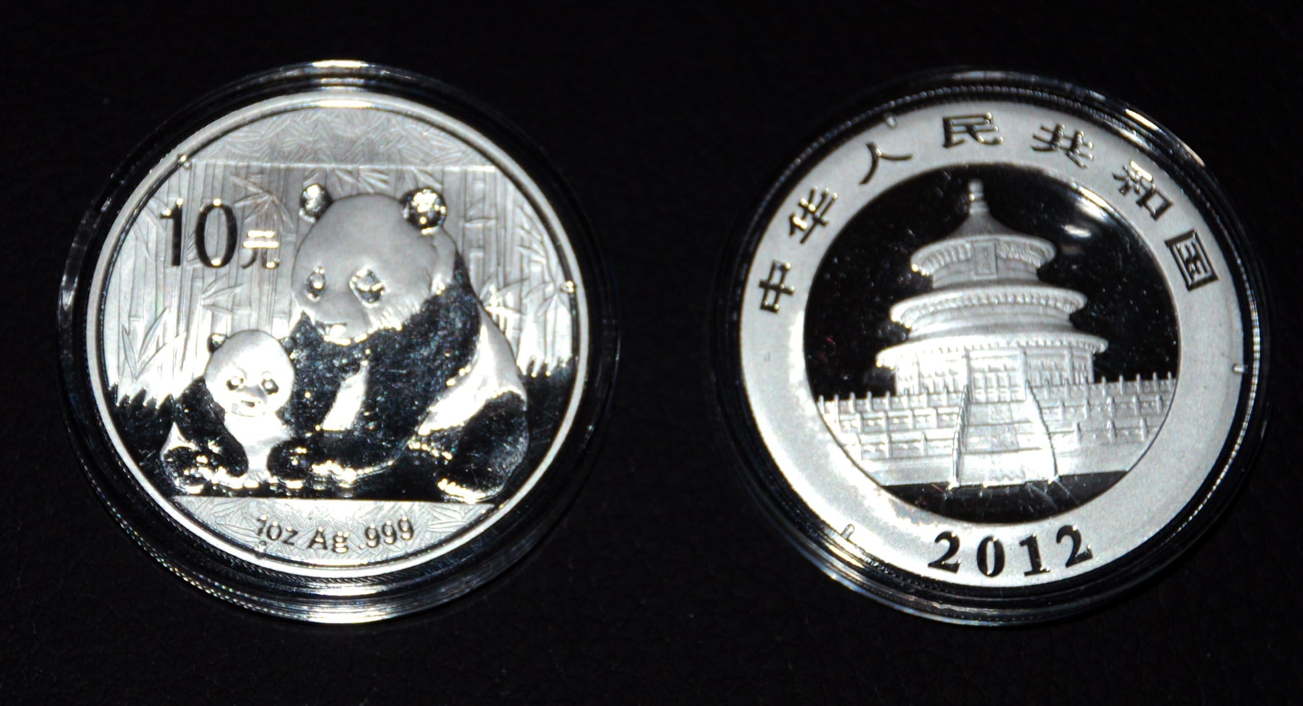 2012 1 oz CHINA PANDA SILVER COIN, 1 troy Oz, .999, with mint capsule