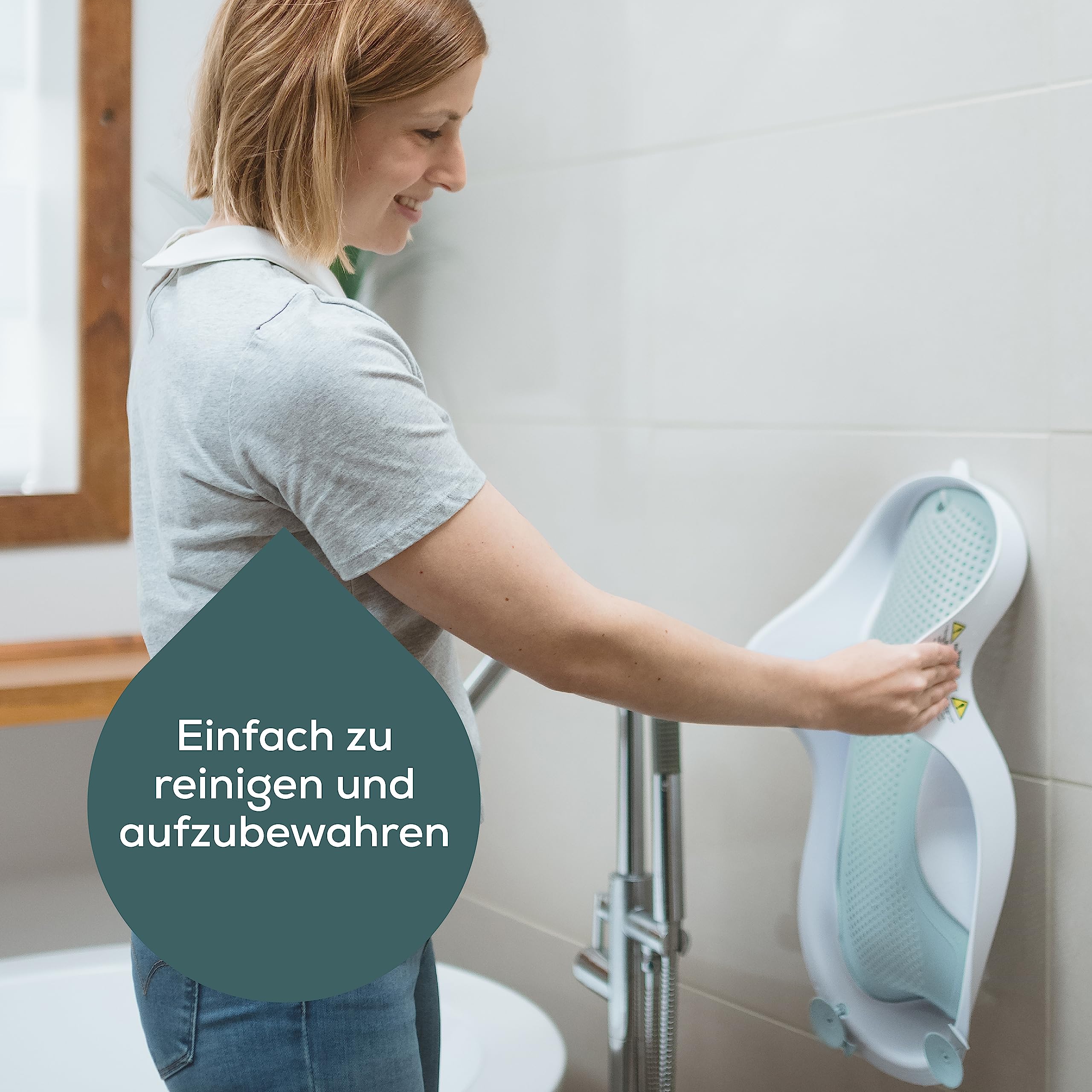 Angelcare Asiento de baño ergonómico para la bañera de bebé Light Aqua, superficie agradable y suave, se puede colgar