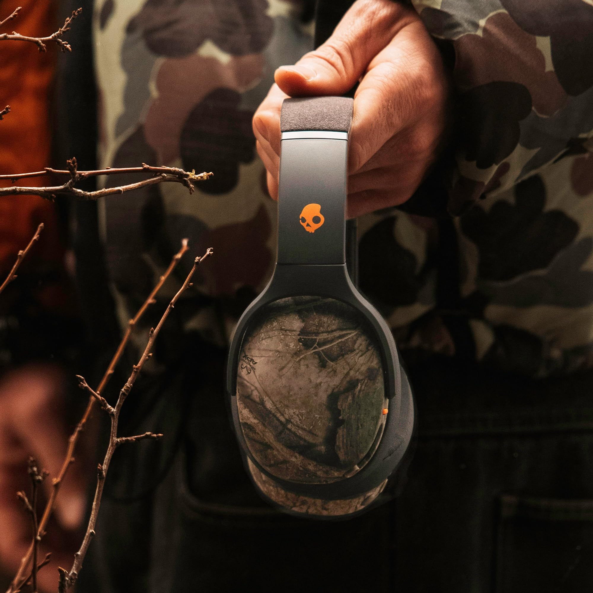 Skullcandy Crusher Evo - Cuffie Bluetooth wireless con bassi multisensoriali, isolamento acustico, fino a 40 ore di batteria, microfono per iPhone e Android, Realtree APX nero/arancione