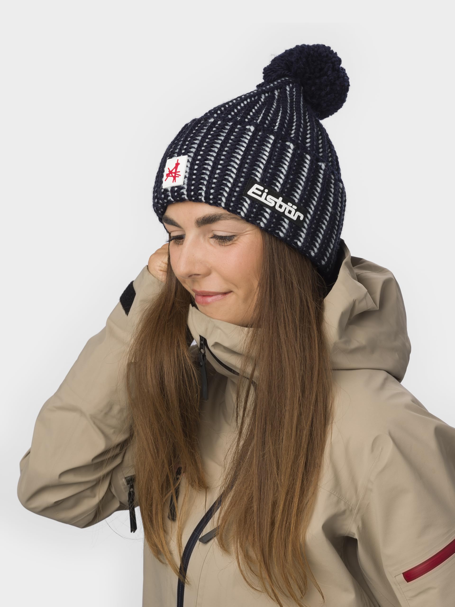 Eisbär Mütze Herren & Damen Ronda Pompon Ski Austria - Merino Wintermütze Unisex mit Fleece schützt vor Kälte und Wind - Bommelmütze warme Lifestyle Strickmütze mit Pompon Haube aus Österreich