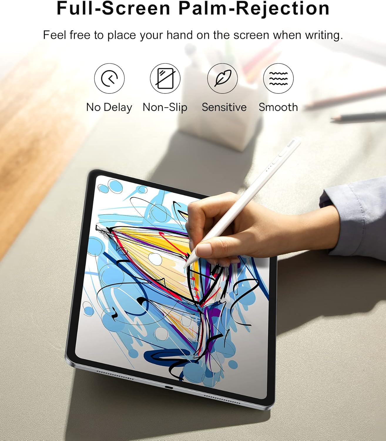 A hand resting on an iPad screen while using the stylus, illustrating the palm-rejection feature.