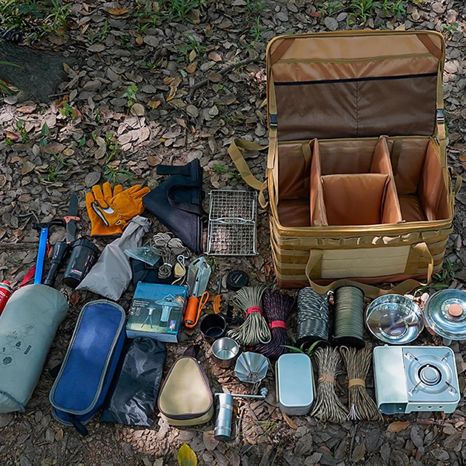 Camping organizer with various camping items neatly arranged inside and around it.