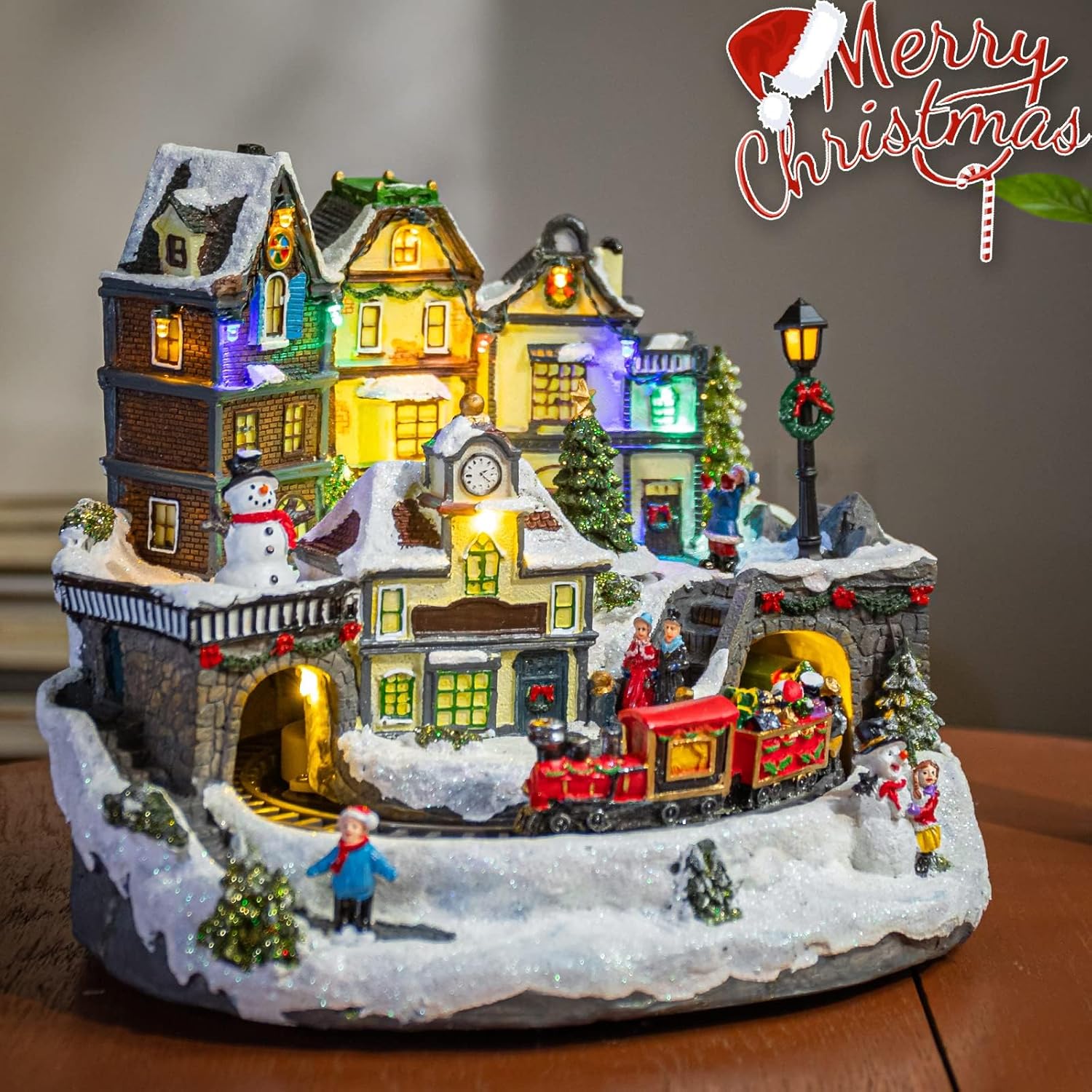 Afirst Christmas Village with Houses, Moving Trains, Rotating Tree, and Musical Light-Up Display