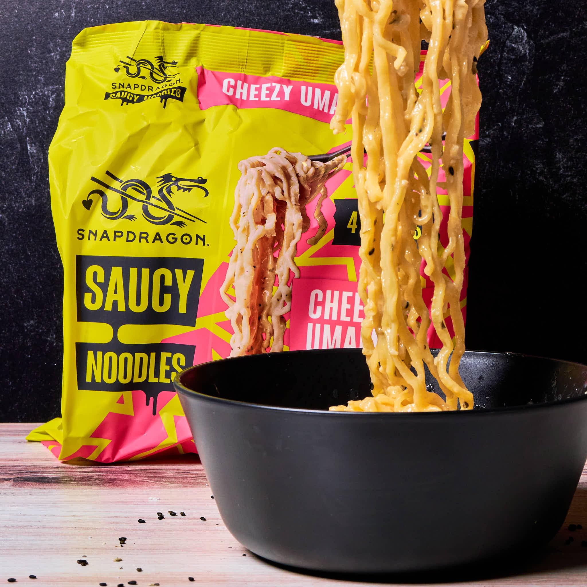 Snapdragon Saucy Instant Noodles with Cheezy Umami, Savory Slurpable Sauce - Quick Meal, Snack, and Lunch. 4-Pack Microwave Noodles for Cup, Bowl, Cheddar Cheese Ramen or Asian Stir Fry