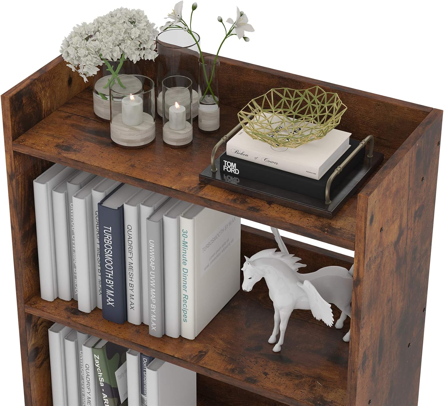 Close-up of the top shelf of the Flrrtenv Bookshelf, showing books, candles, and decorative vases.
