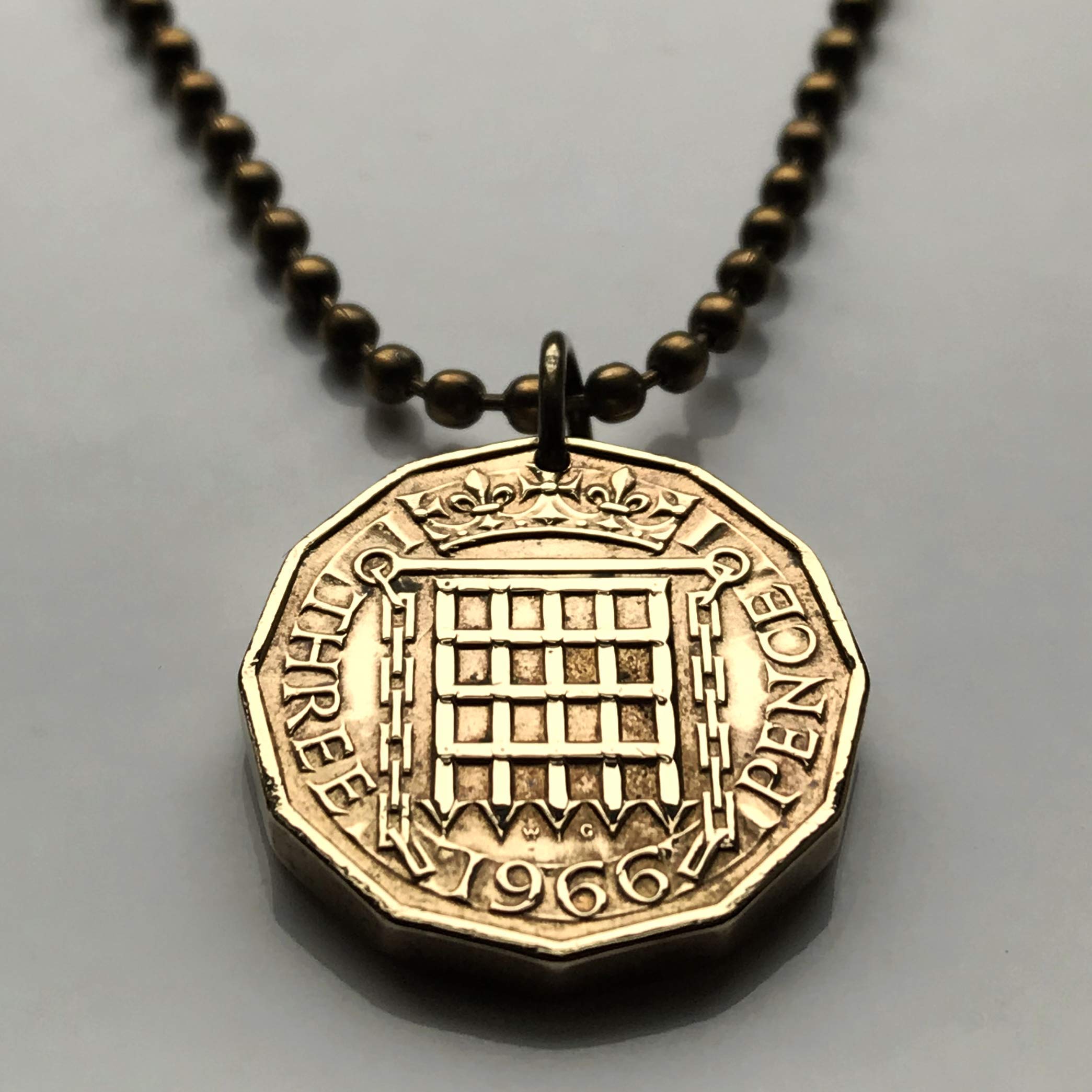 1962 England United Kingdom Great Britain 3 Pence coin pendant Tudor portcullis gate House of Beaufort Amberley Hever Castle Westminster Palace Monk Bar Tower of London Birmingham Leeds York n000415