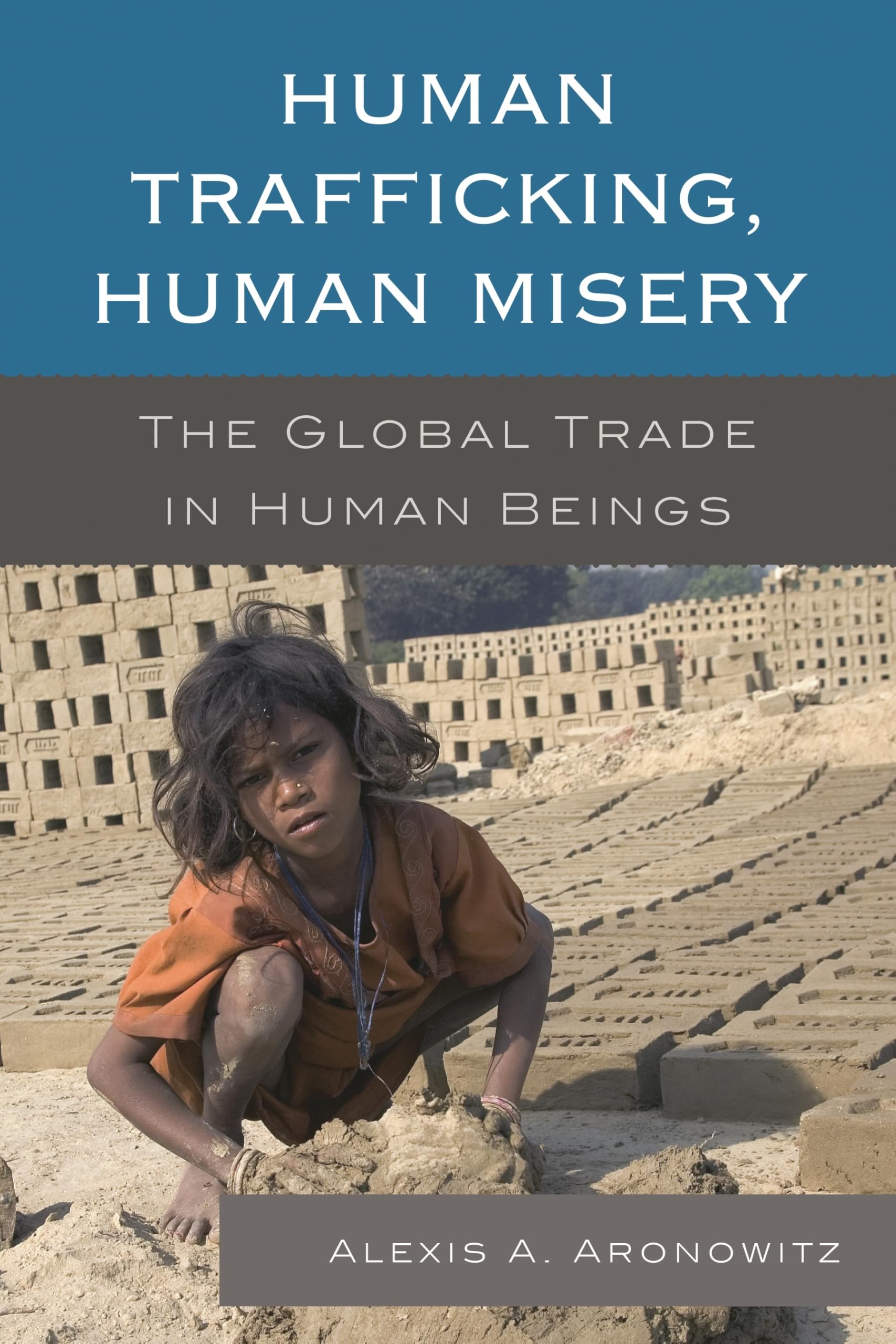 Human Trafficking, Human Misery: The Global Tra. Aronowitz Paperback<|